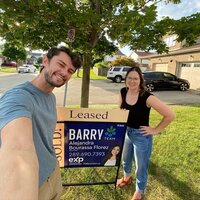 Alejandra with a sold sign